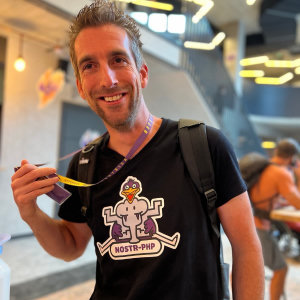 Sebastian at Nostriga 2024 wearing my Nostr-PHP t-shirt